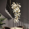 JC Ginkgo Cascading A Branch Chandelier in Staircase